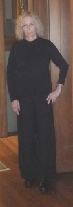 Ann Taylor is wearing Eileen Fisher black, with Dansko clogs and a sterling silver bracelet probably made by her mother.