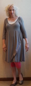 Ann Taylor is wearing her first H&M dress, an Eileen Fisher tank, Target leggings, and Gentle Souls.
